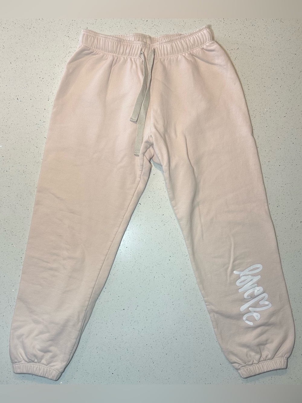SoulCycle x Curtis Kulig "Love Me" soft pink sweatpants / limited edition EUC